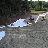 Pontage des chutes de terre avec des géotextiles tissés